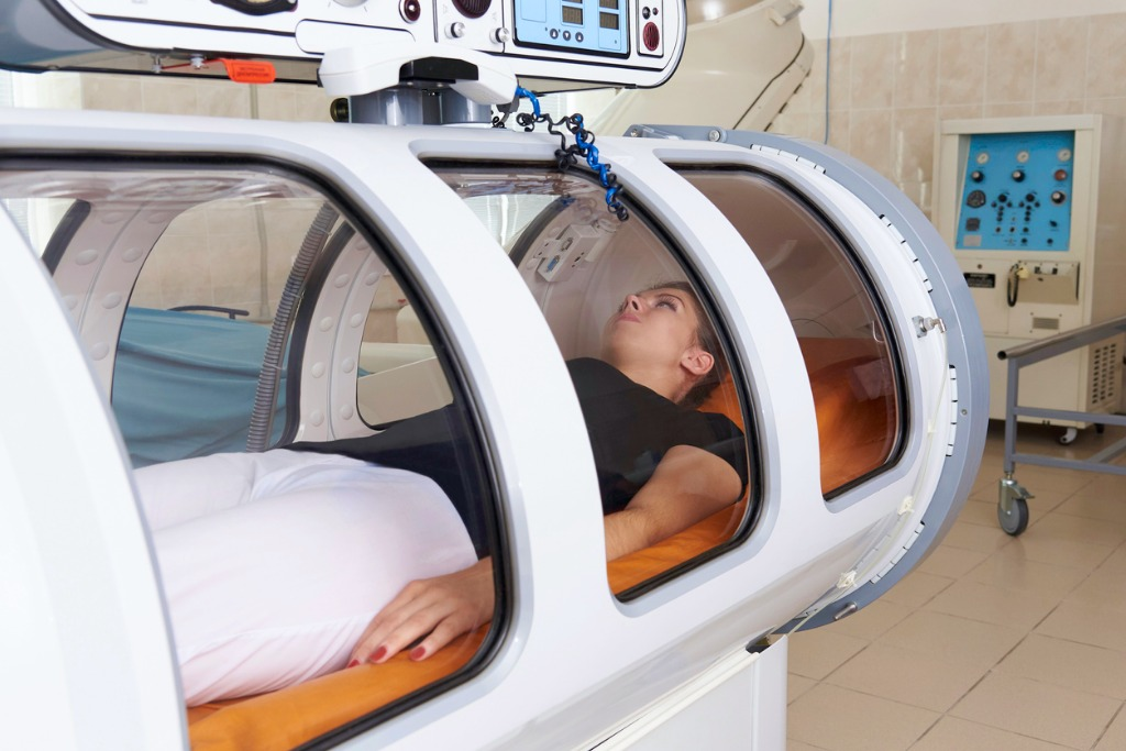 Is hyperbaric oxygen chamber therapy a painful process?